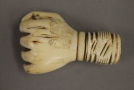 A 19th century carved ivory fist