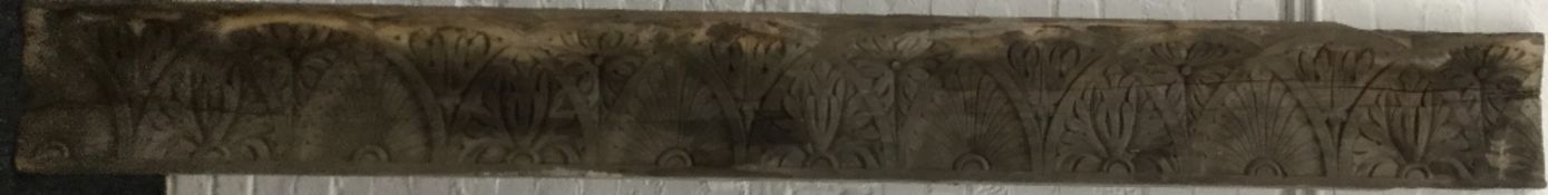 A 19th century carved wooden frieze