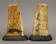 A pair of bone souvenir vases