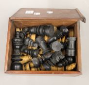 A boxed turned wooden chess set