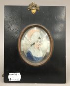 A 19th century portrait miniature depicting a young lady