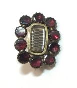 A Georgian gold and garnet mourning brooch