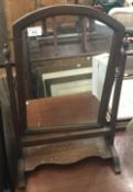 An oak dressing table mirror