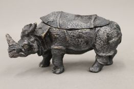 A cold painted bronze inkwell formed as a rhinoceros