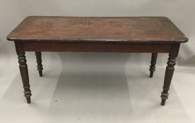 A Victorian mahogany topped farmhouse table