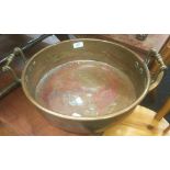 A 19th century twin handled copper preserve pan