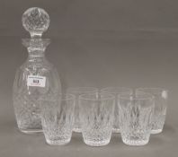 A Waterford cut crystal decanter and a set of six tumblers en-suite.