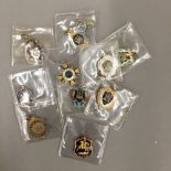 Ten early 20th century enamelled racing badges predominately for Gatwick Racecourse