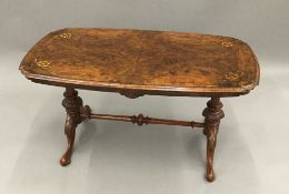 A low Victorian walnut centre table