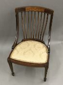 An Edwardian inlaid mahogany side chair