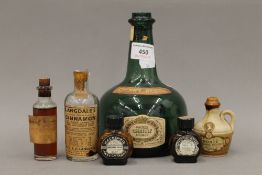 A musical cherry liqueur bottle and other bottles