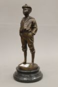 A bronze model of a young boy