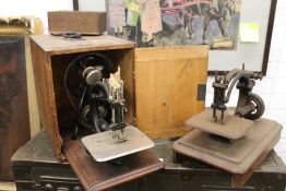 A cased Willcox & Gibbs sewing machine,