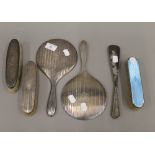 A quantity of silver dressing table items,