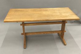 A modern oak kitchen table and a set of pine kitchen chairs