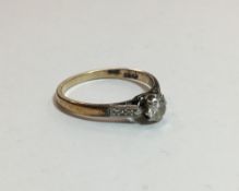 An 18 ct gold and platinum diamond solitaire ring (2.