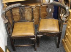 Two 19th century carved oak corner chairs