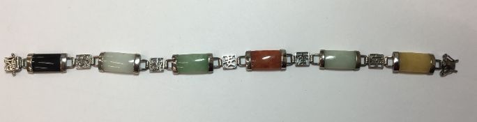 A 925 silver and variously coloured jade bracelet