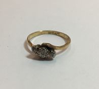 An 18 ct gold and platinum diamond illusion set ring (2.