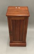 A Victorian walnut pot cupboard