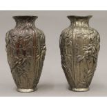 A pair of Japanese cast metal vases with bamboo decoration