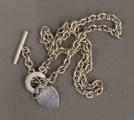 A silver T-bar and heart necklace (40.