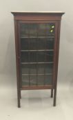 An Edwardian mahogany display cabinet