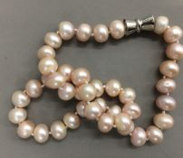 A string of pink pearls