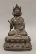 A Chinese bronze model of Buddha