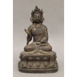 A Chinese bronze model of Buddha