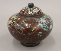 A 19th century Japanese cloisonne pot and cover