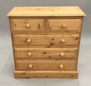 A modern pine chest of drawers