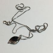 A silver pendant necklace,