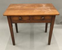 A 19th century mahogany two drawer side table