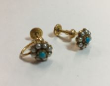 A pair of unmarked turquoise and seed pearl earrings
