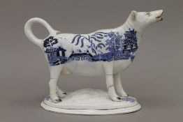 A 19th century Staffordshire cow creamer