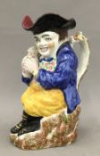 A 19th century pottery toby jug