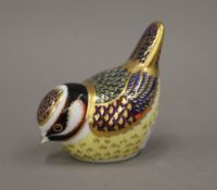 A Royal Crown Derby paperweight formed as a blue tit