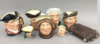 A quantity of Royal Doulton character jugs and a camera