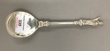 A silver apostle spoon (66.