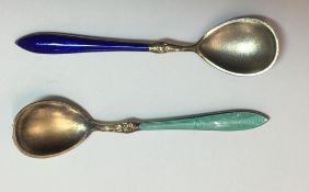 Two silver and enamel salt spoons