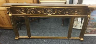 A reproduction gilt framed triple plate mirror