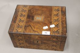 A Victorian inlaid walnut jewellery box