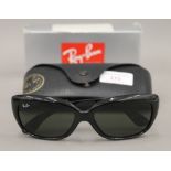 A boxed pair of Ray-Ban sunglasses