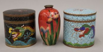 A small cloisonne vase and two cloisonne lidded boxes