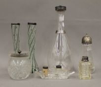 Two silver mounted vases, a silver mounted carafe, etc.