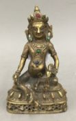 A bronze stone set model of Buddha