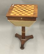 A 19th century inlaid rosewood games/work table