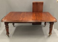 A Victorian mahogany two leaf extending dining table