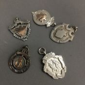 Five silver fob medallions